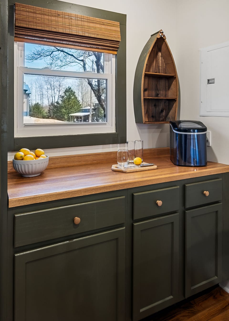 Ice maker and kitchen prep space. 