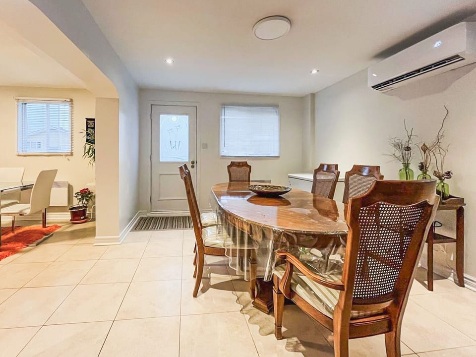 Second dining room with door that goes to the backyard