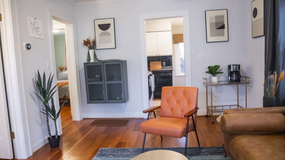 Living room. Coffee/wine bar nook and storage cabinet.