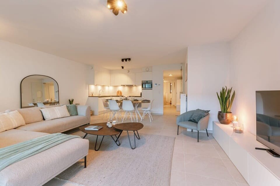 Inviting and elegant living area with direct access to terrace and open kitchen