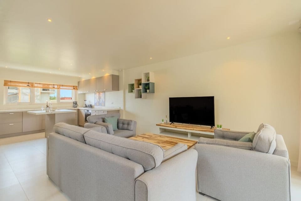 Indulge in comfort and entertainment in Villa Twin A`s spacious living room, complete with a large TV. With plush seating and stylish decor, this is not just a room; it`s a sanctuary for relaxation and shared moments.