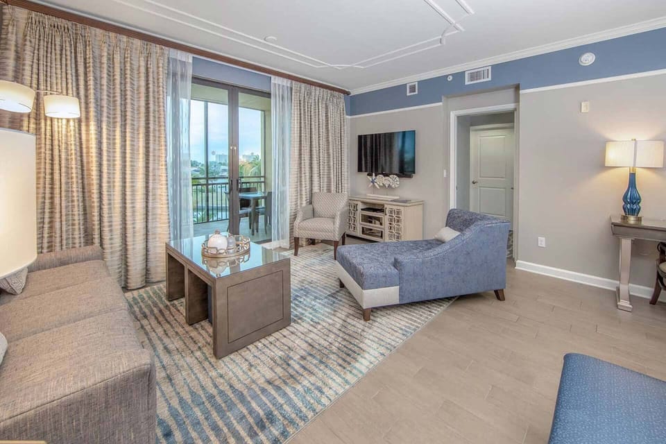 Luxuriously appointed living room with a sleeper sofa.