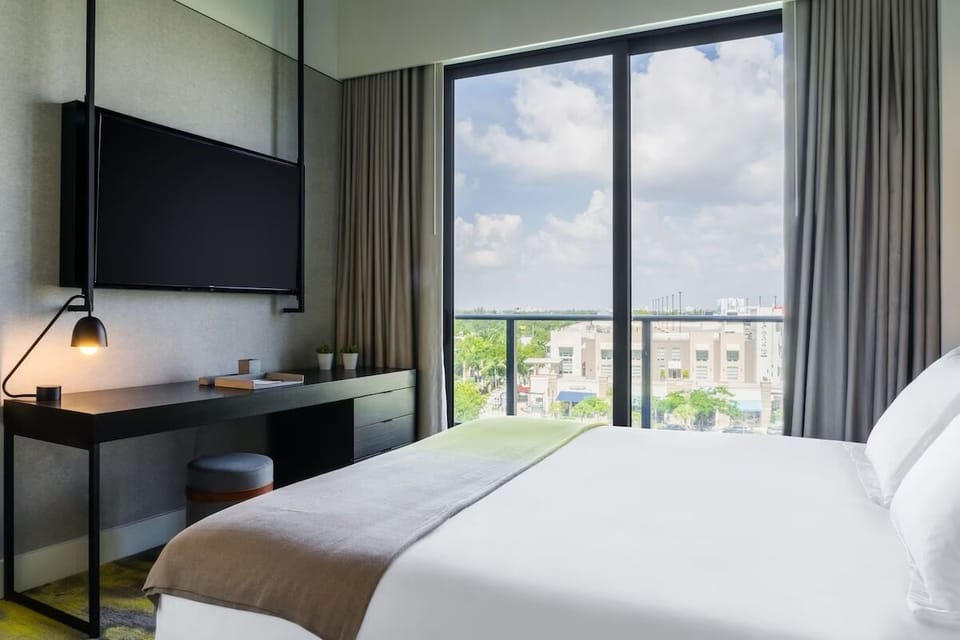 Wake up to big-sky views from a serene, modern bedroom.