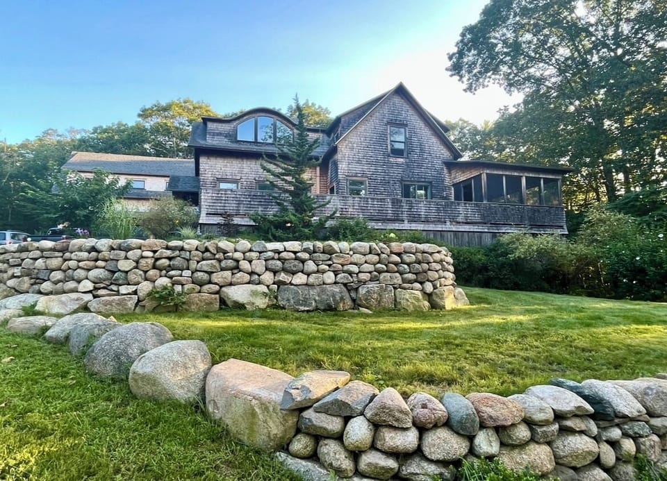 Front of house, large, terraced lawns for children to play. 