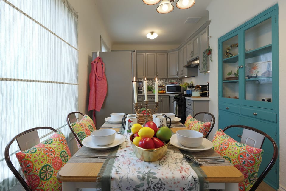 A charming dining nook with a beautifully set table