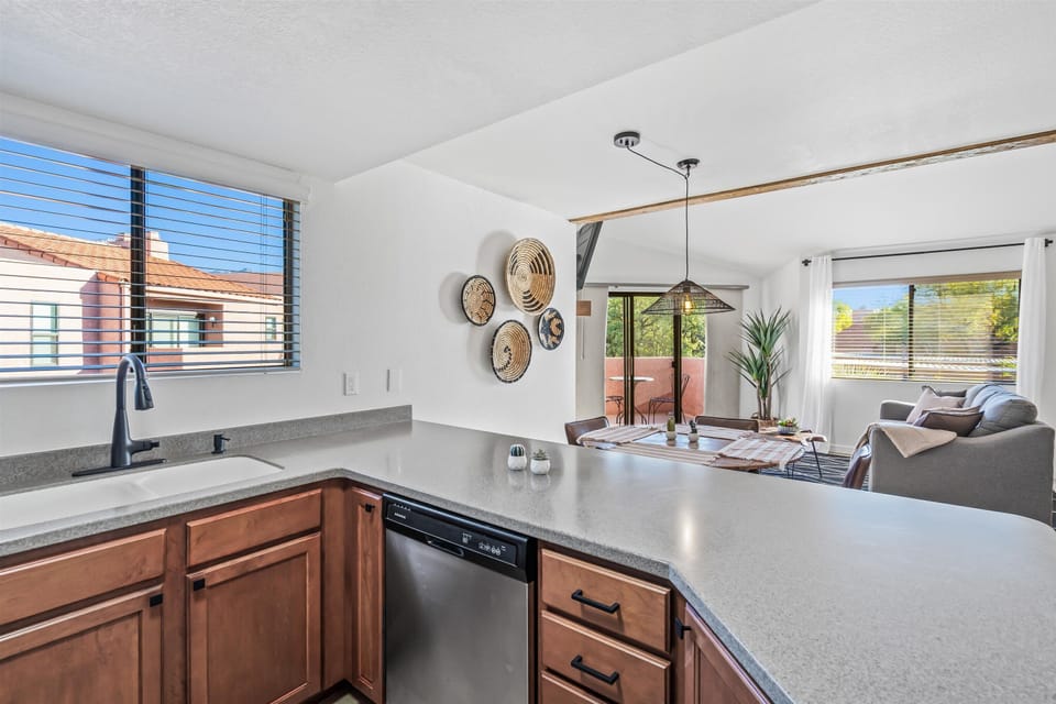 Modern Kitchen with dishwasher, and counter bar seating.