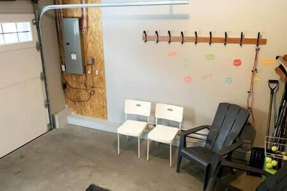 Small garage "mud room" to store skis, snowboards, bicycles, etc. Not for cars.
