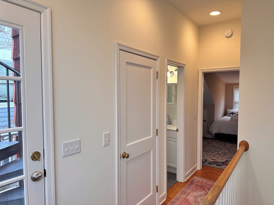 upstairs hallway to hall bath and bedrooms