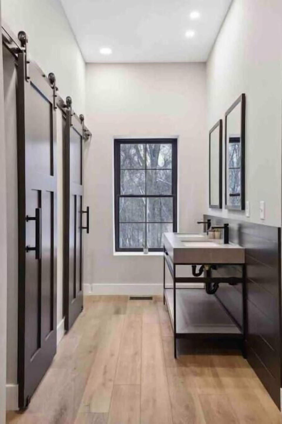 Our bunk room bath can accomodate 4 guest with 2 private showers/stool rooms
