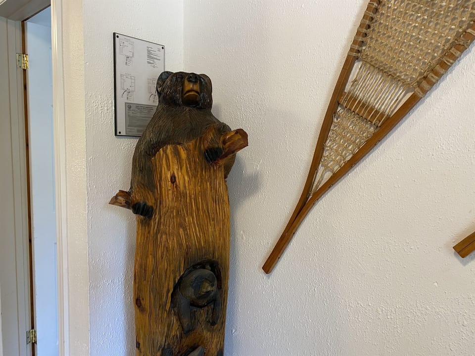 Wood carving of bears