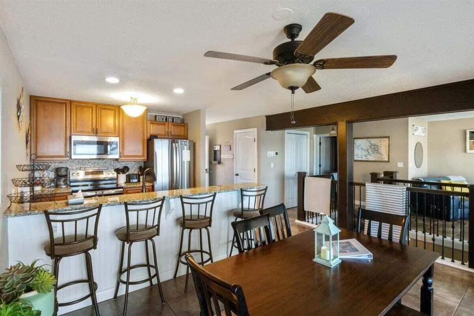 Classy and modernly-designed kitchen with everything you need for meals in
