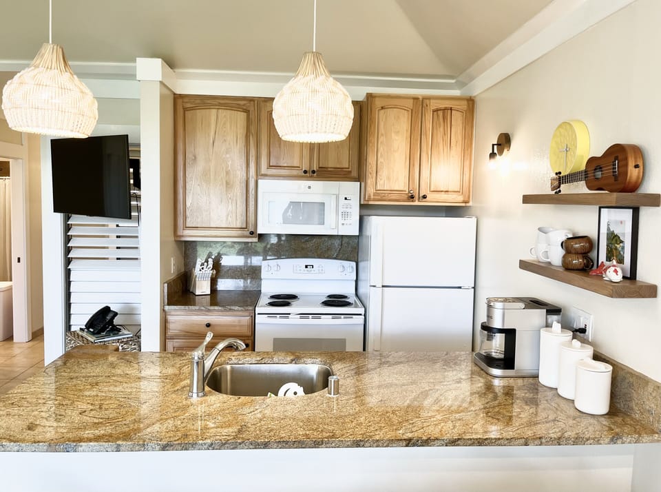 Full Kitchen w/Dishwasher and Garbage Disposal. 

