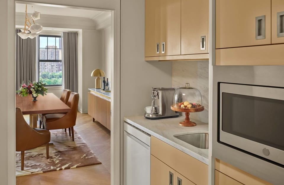 Sip morning coffee beside a chic kitchenette and dining nook.