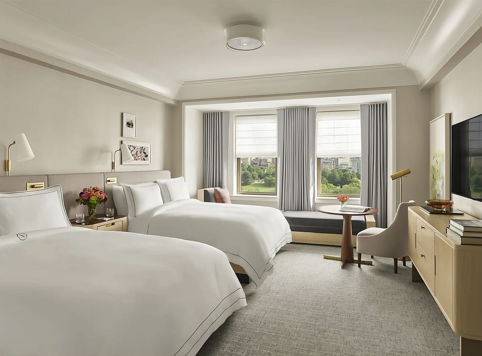 Stretch out in airy comfort with a calming park-view backdrop.