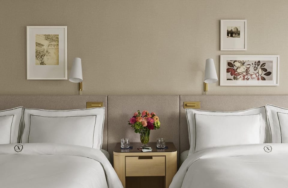 Share restful nights with crisp linens and thoughtful bedside lighting.
