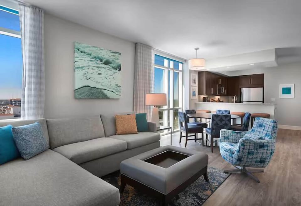 Gather together in airy open-plan comfort, steps from the view.