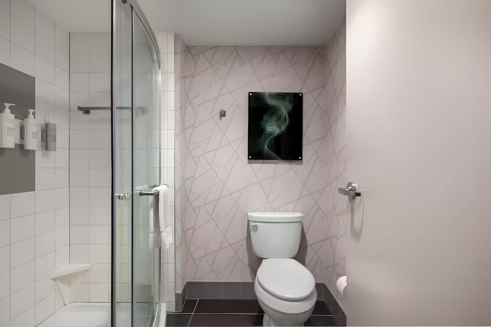 Refresh with a sleek walk-in shower and bright, clean finishes.