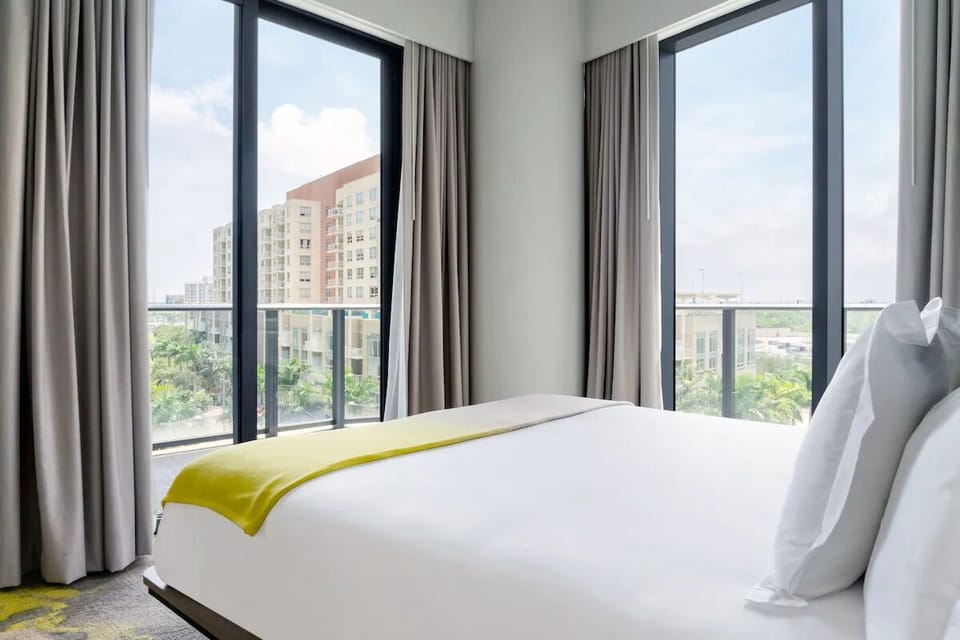 Bask in panoramic corner windows for a calm, airy escape.