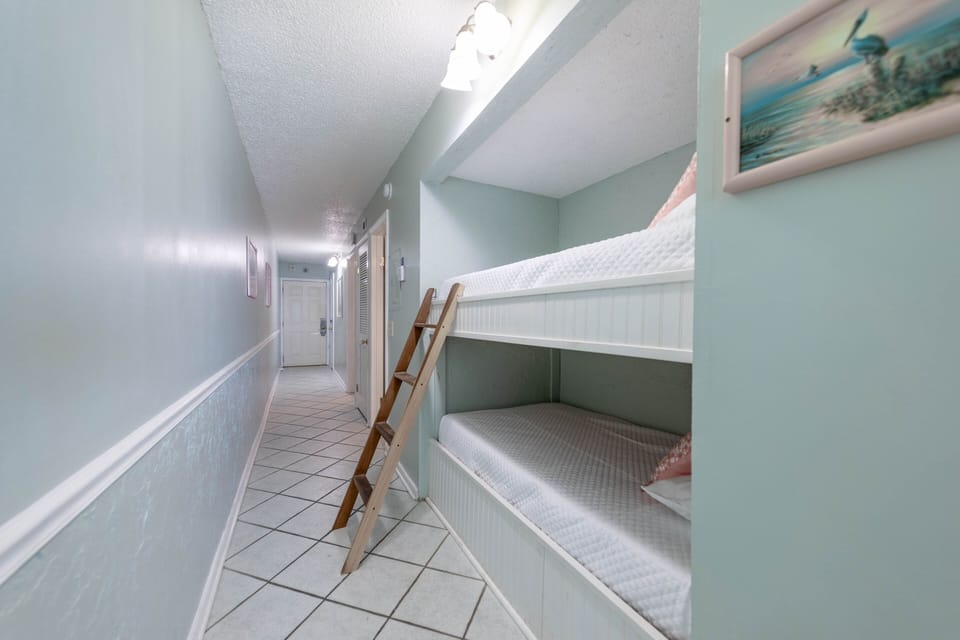 Twin size bunkbeds in the hallway nook.