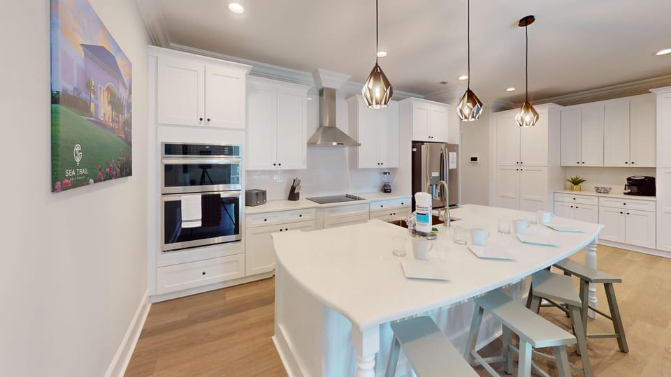 Sleek, high-end appliances and generous counter space make this kitchen ideal for preparing meals during your stay.