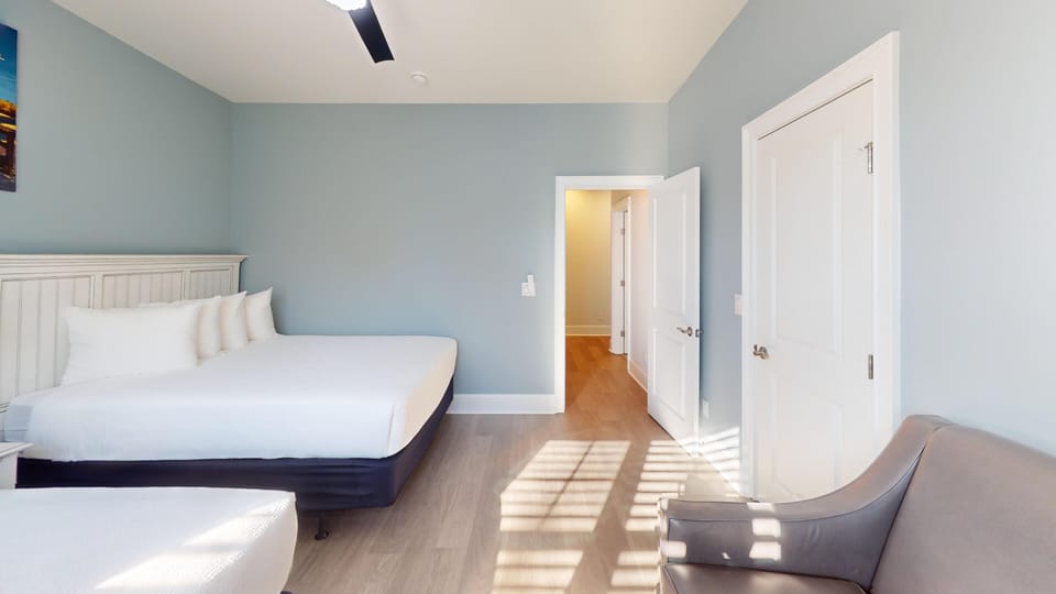 Second guest bedroom with contemporary décor and comfortable sleeping arrangements.