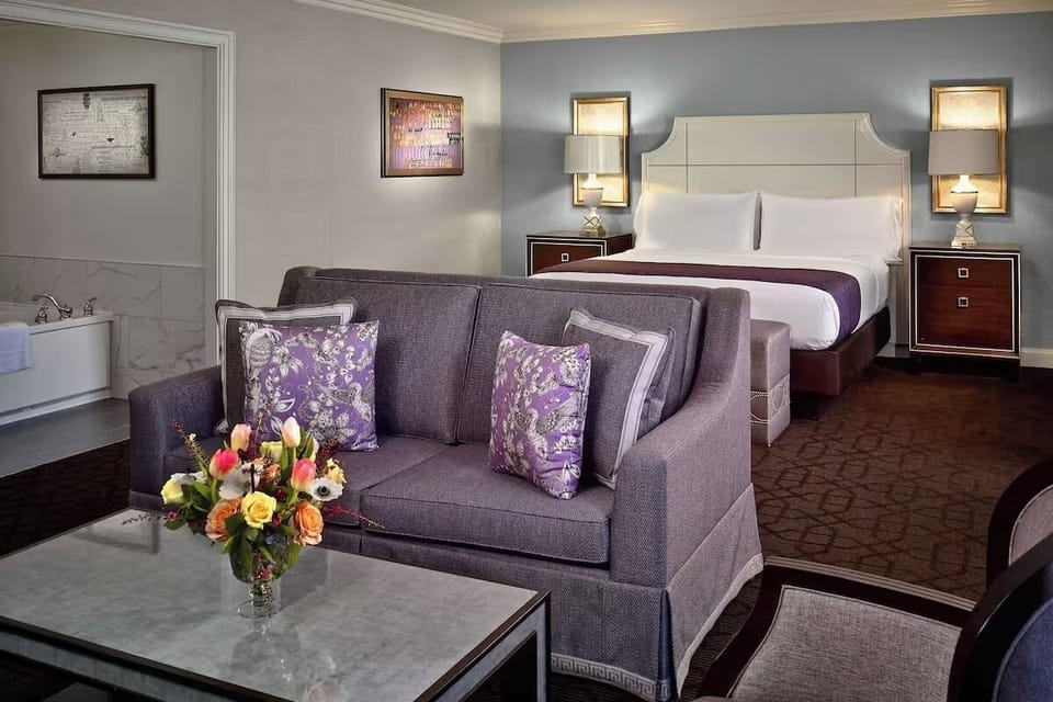 Unwind in a spacious suite with cozy lounge seating.