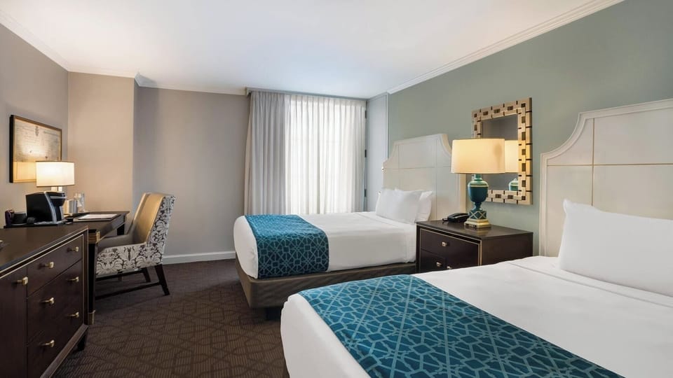 Settle into two cozy beds with bright, airy daylight.