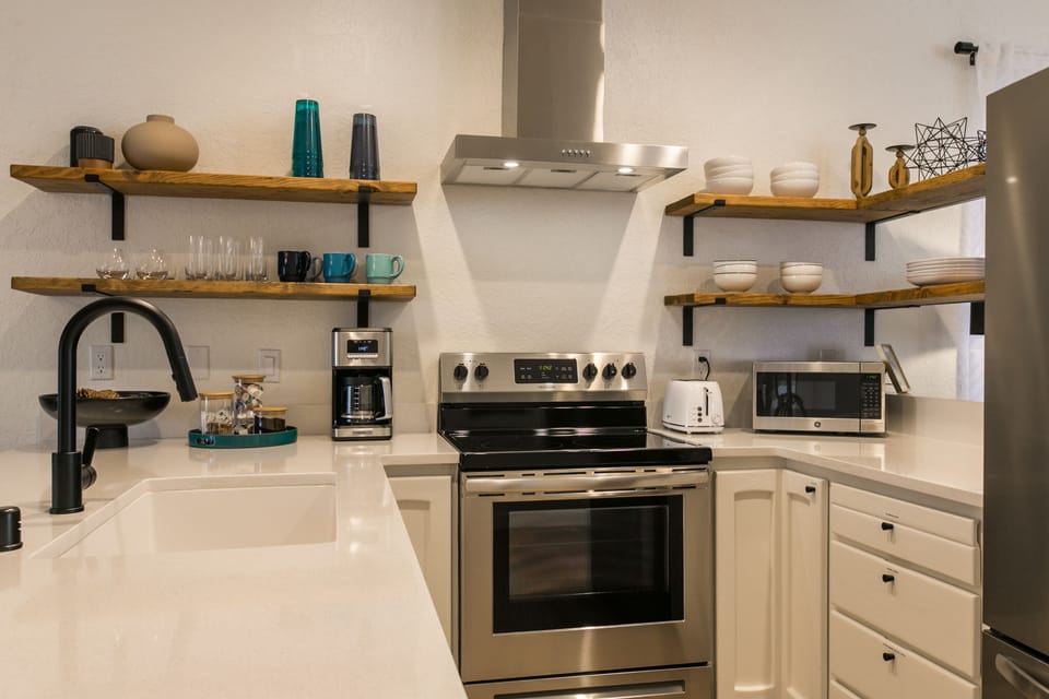 Lovely well-stocked Kitchen with complimentary local coffee.