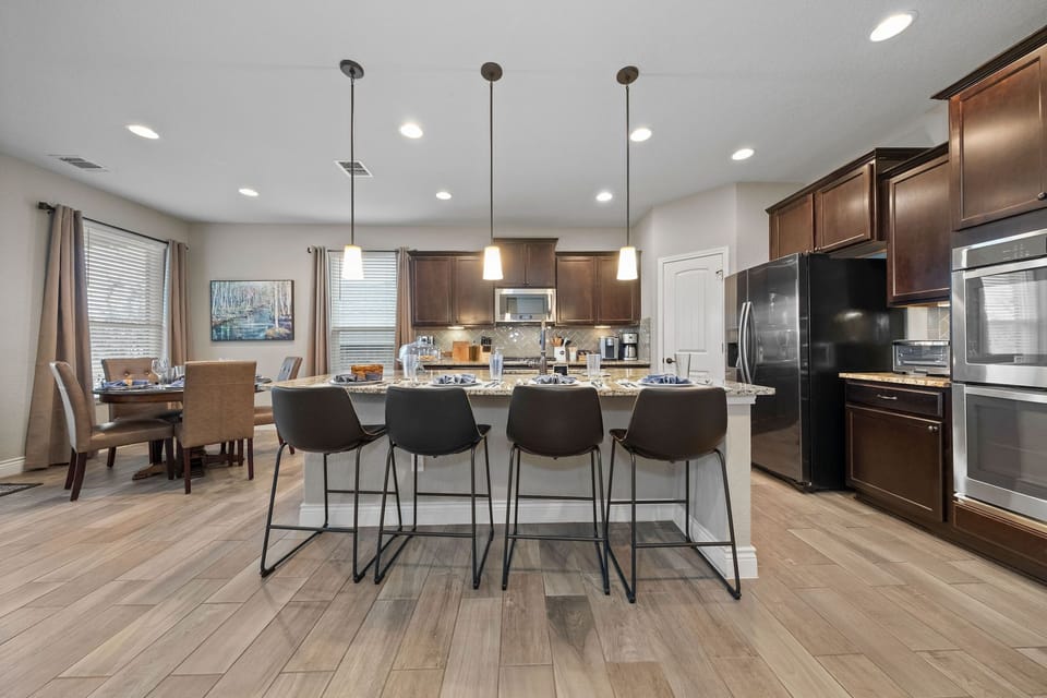 Enjoy time with your family in our Chef's kitchen with gas cooktop & double oven
