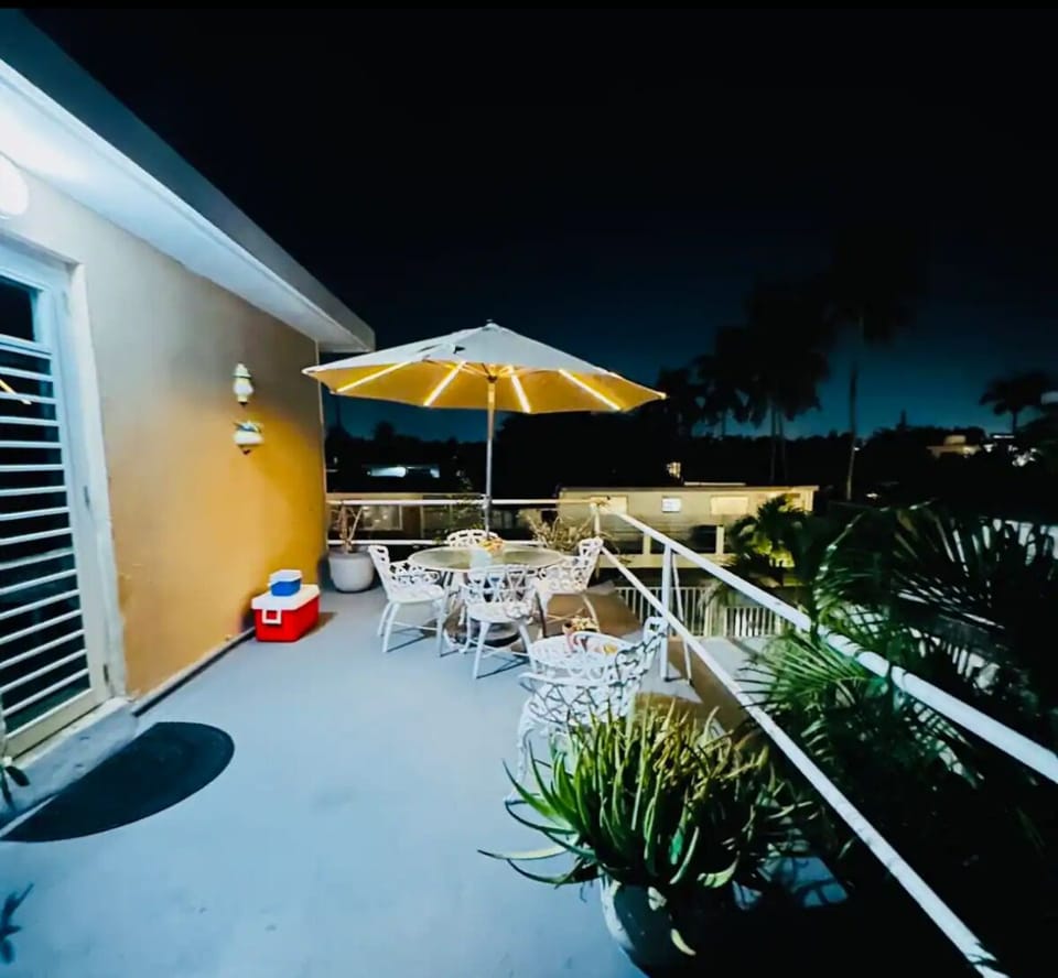 1st terrace, lovely sunsets and outdoor dining/cocktails. Led lit Umbrella.