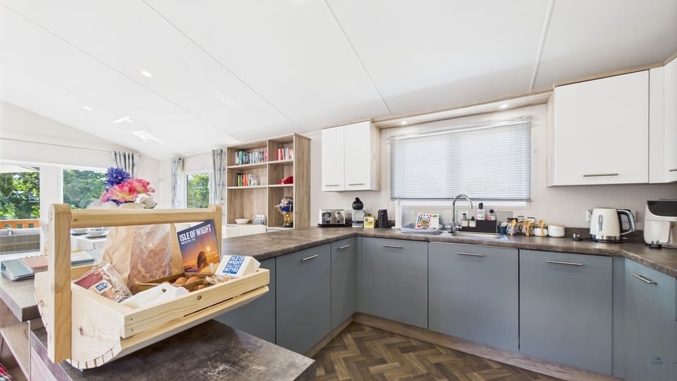 Well-equipped kitchen with dishwasher, washer/dryer, microwave and oven.