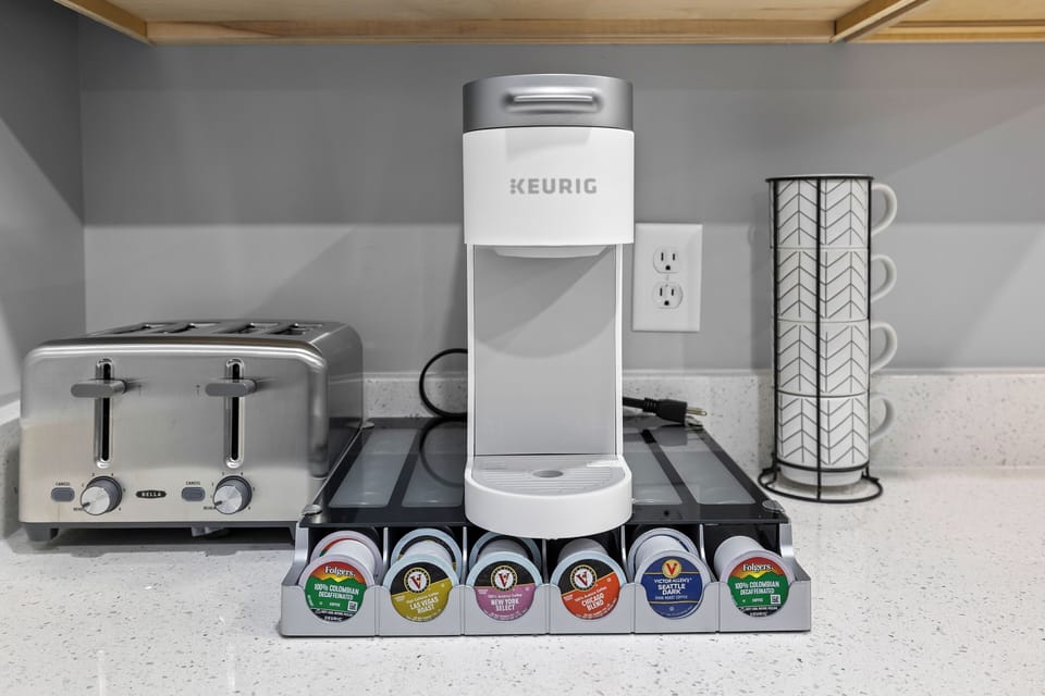Toaster, coffee mugs, and coffee maker/ Keurig with K-Cups