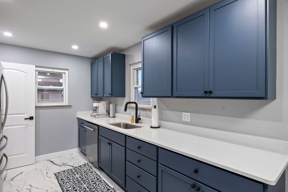 Fully equipped kitchen with dishwasher and appliances