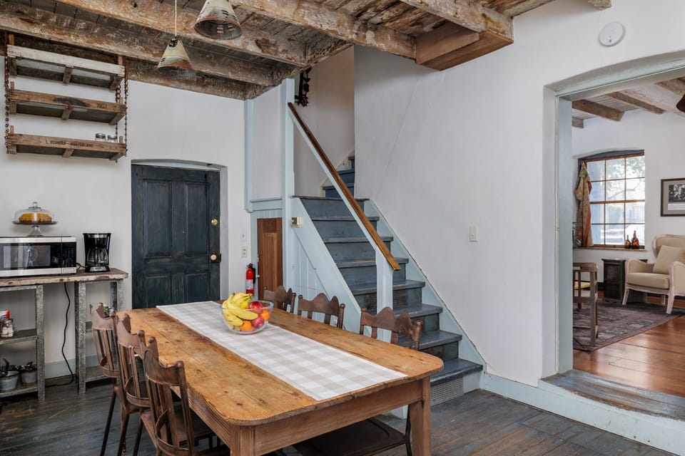 Experience the warmth of Southern hospitality in the dining area, a welcoming space for family and friends to come together.