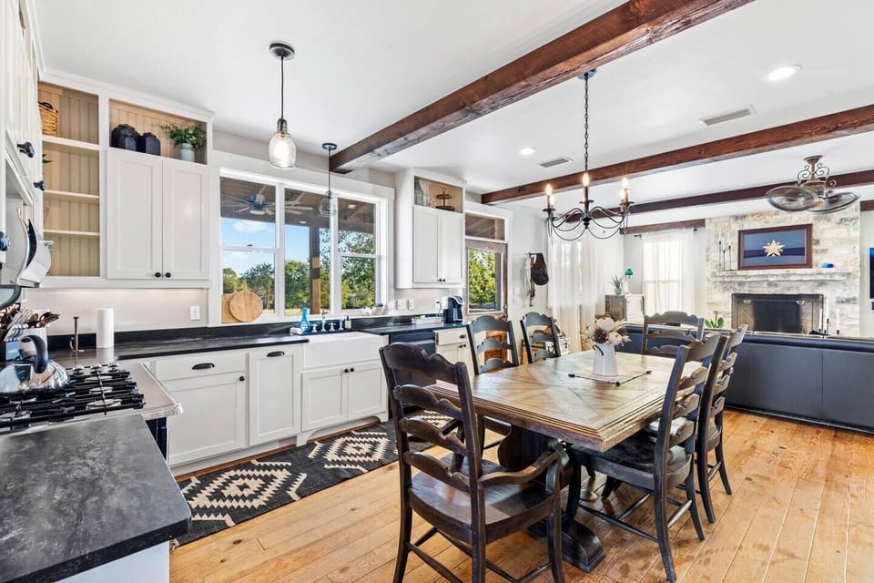 Fully stocked kitchen and a dining table for everyone to sit at