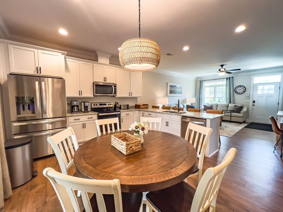 Huge eat-in kitchen with large table and chairs.