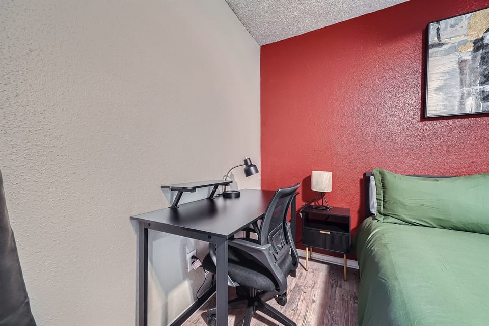 Primary Bedroom with office desk and chair