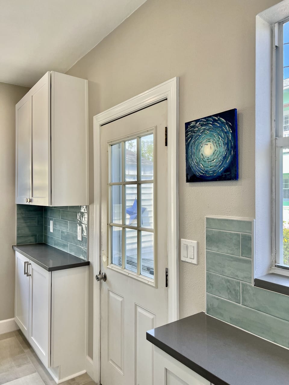 Kitchen door leads out to the patio.