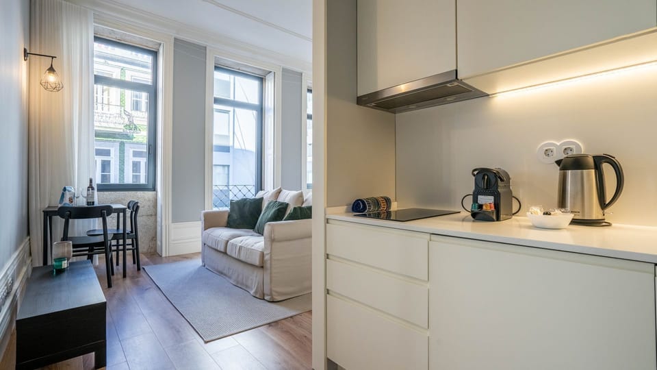Our fully equipped kitchenette is ready for your culinary creations. Whip up delicious meals with top-notch amenities at your fingertips. #Cooking #LovelyStay