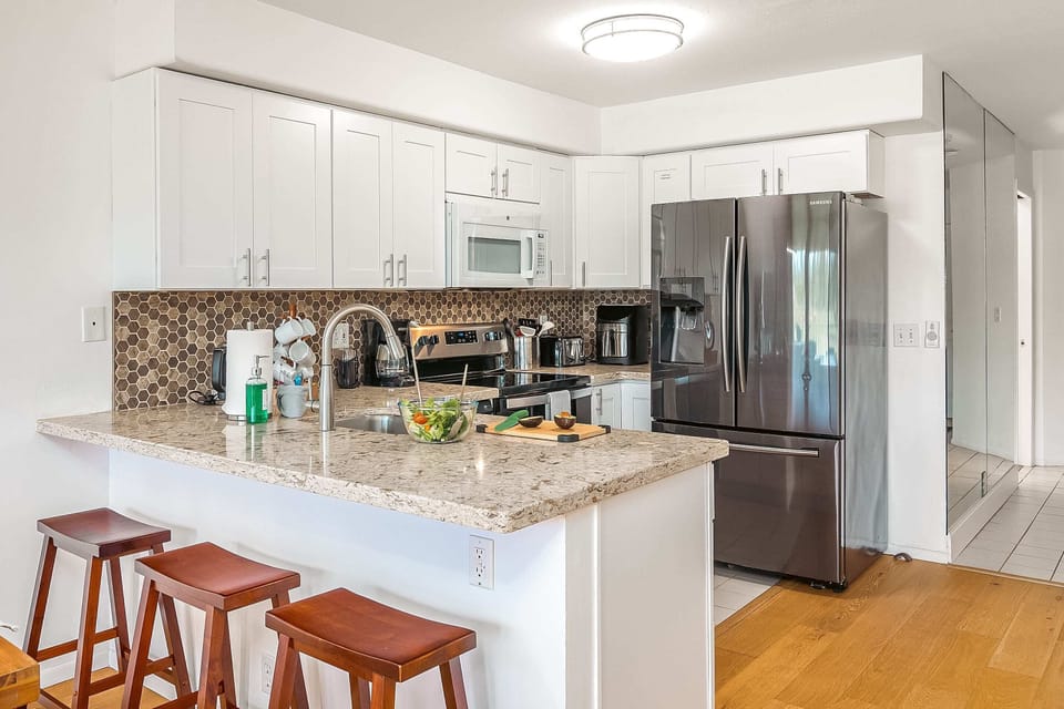 Kitchen has enough space that you won't feel cramped when making a meal
