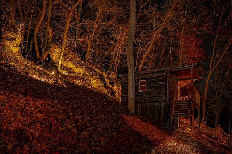 Boulders and Cliffs Lit up at Night