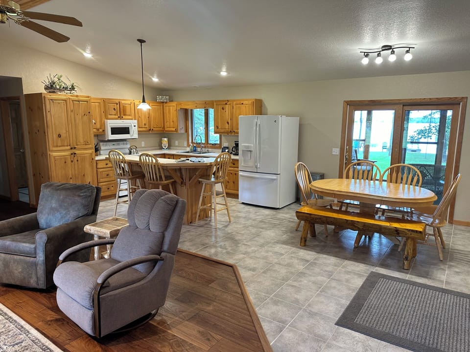 The open living/dining/kitchen space makes for great meal prep and dining.