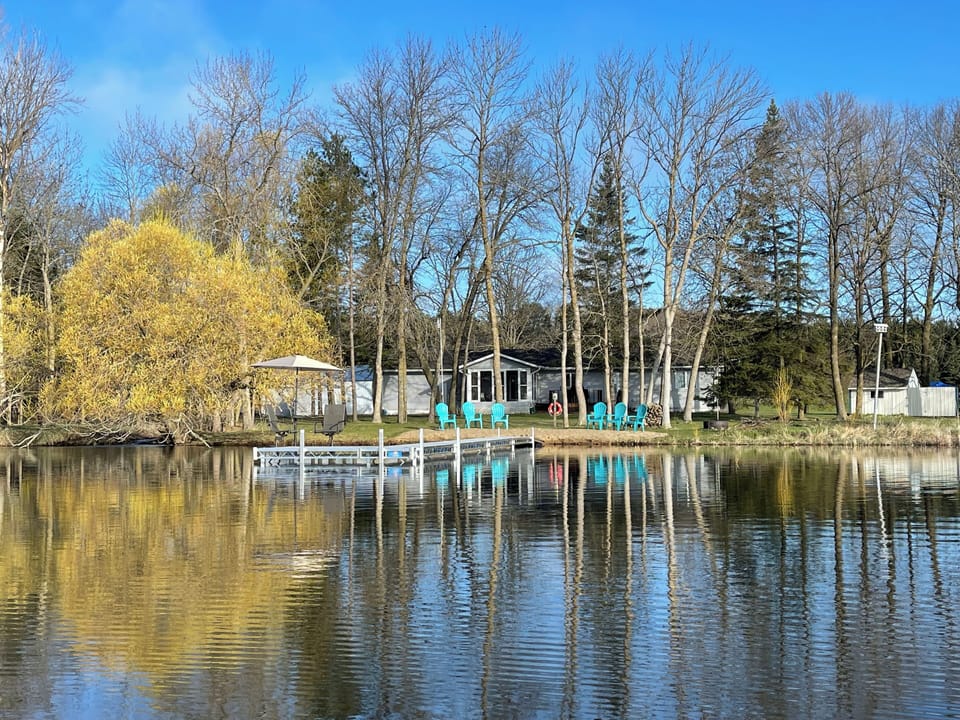 Relax and enjoy the chairs and umbrella on the dock!