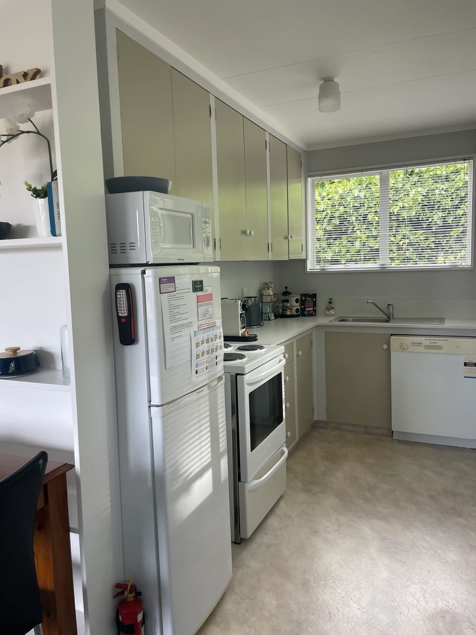 Full kitchen inc oven/stove, dishwasher, cookware.