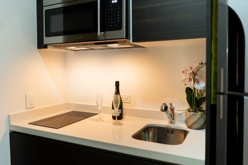Modern kitchenette; quick meals made easy.