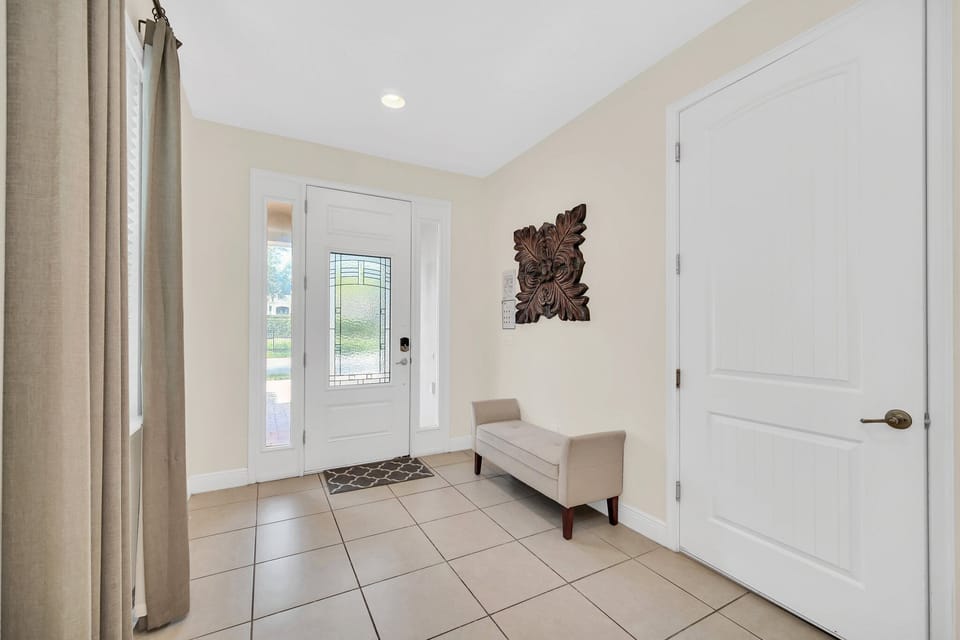 Practical flow from bedroom to bath and hallway—designed for easy navigation in group settings.
