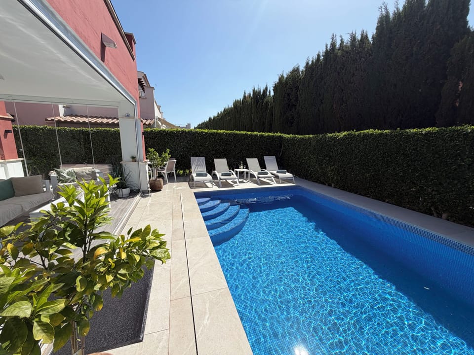 New pool tiling + aluminium furniture