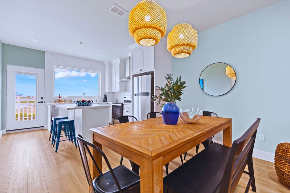 Gather around the dining table to share meals, play games, or enjoy quality time together