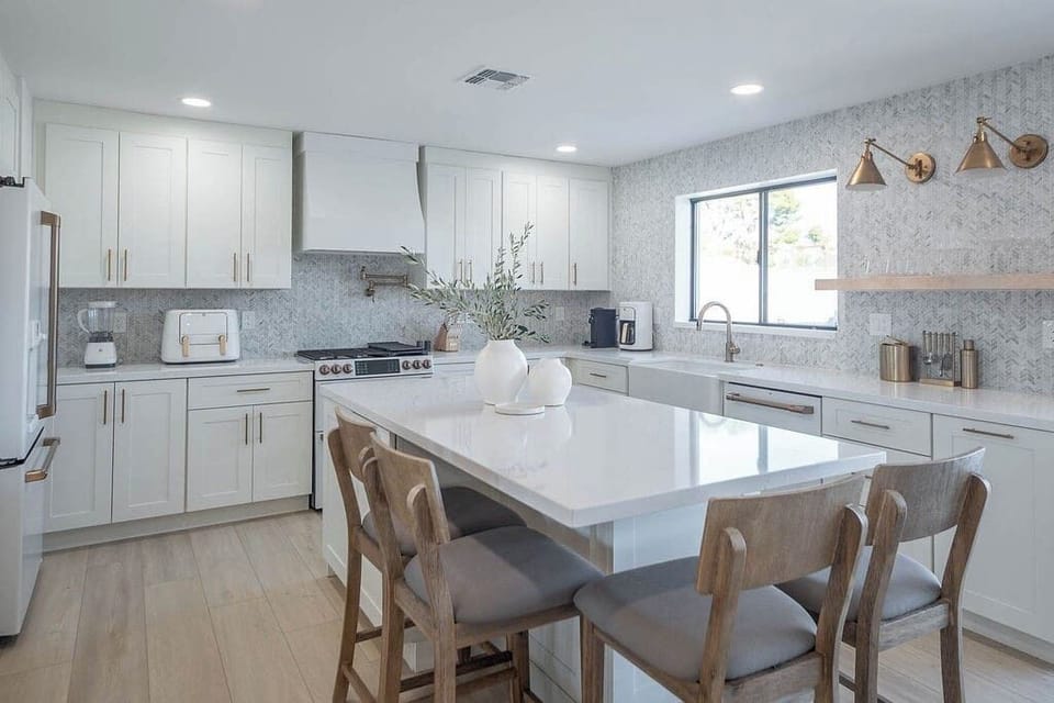 Kitchen includes a nespresso machine, air fryer, blender & also traditional coffee maker.