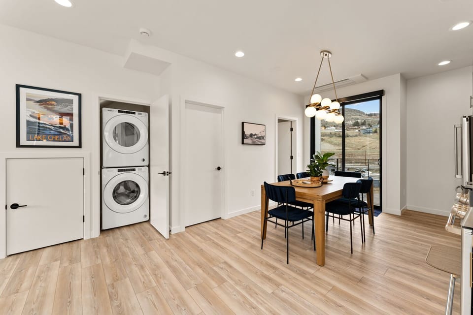 Spacious dining area and a full sized washer and dryer